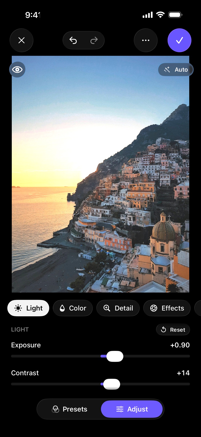 The Light adjustments: exposure and contrast sliders over a Positano sunset